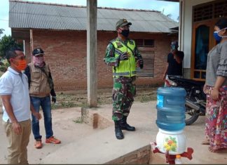 Babinsa Koramil 426-01 Mesuji Sosialisasi Covid-19 dari Rumah ke Rumah