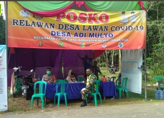 Babinsa dan Babinkamtibmas Bersinergi monitoring Posko Mandiri Covid-19 Desa Adi Mulyo