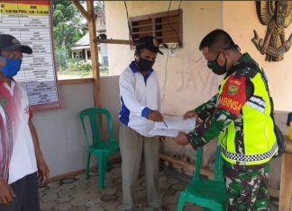 Babinsa Koramil Menggala Cek Posko Covid-19 Banjar Dewa Wujudkan Kemanunggalan TNI-Rakyat.