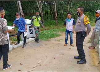 Babinsa dan Babinkamtibmas Dampingi Tim Monev Dinas PMD di Margo Bakti