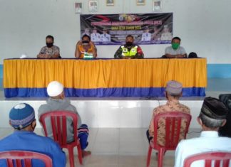 Babinsa dan Babinkamtibmas Kawal Penyaluran BLT- DD tahap- II di Bujung Buring Baru