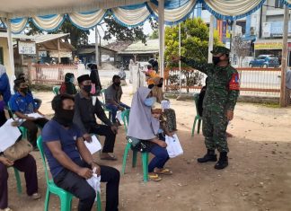 Danramil 426-02 Menggala Pantau Langsung Penyaluran BST di Kantor Pos Unit- 2 Banjar Agung.