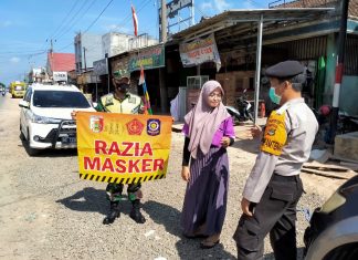 Koramil 426-02 Menggala dan Polsek Banjar Agung Melaksanakan Operasi Yustisi Covid-19