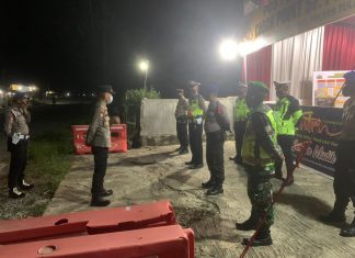 Anggota Koramil Rawajitu Bersama Tim Gabungan Memperketat Pembatasan Mudik Lebaran Tahun 2021 dan yustisi Covid 19.