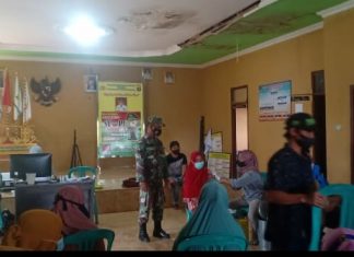 Serka Exnasius Babinsa Koramil Rawajitu Pastikan Vaksinasi Berjalan Aman dan Lancar