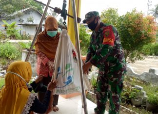 Peduli Kesehatan Balita, Serda Ludin Dampingi Petugas Program Posyandu
