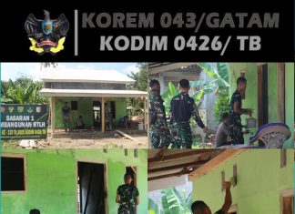 Pengecatan Tembok RTLH Sasaran 1 TMMD ke-125 di Kampung Moris Jaya