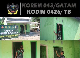 Satgas TMMD 125 Kodim Tulang Bawang Kerjakan Pengecatan Kusen RTLH di Kampung Moris Jaya